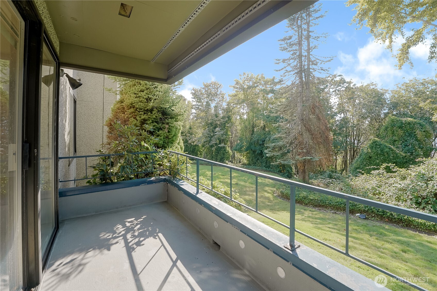 1100 South Atlantic Street, Unit 209 Seattle, WA 98134 - Photo 26 of 31 a view of a balcony with trees