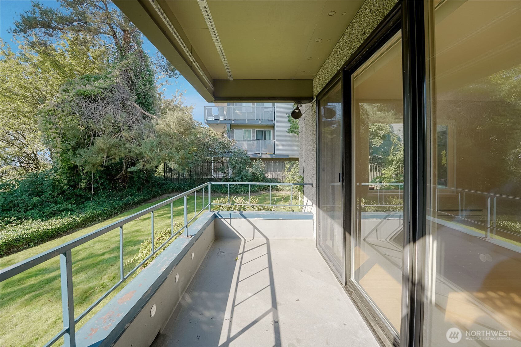 1100 South Atlantic Street, Unit 209 Seattle, WA 98134 - Photo 27 of 31 a view of balcony with a swimming pool