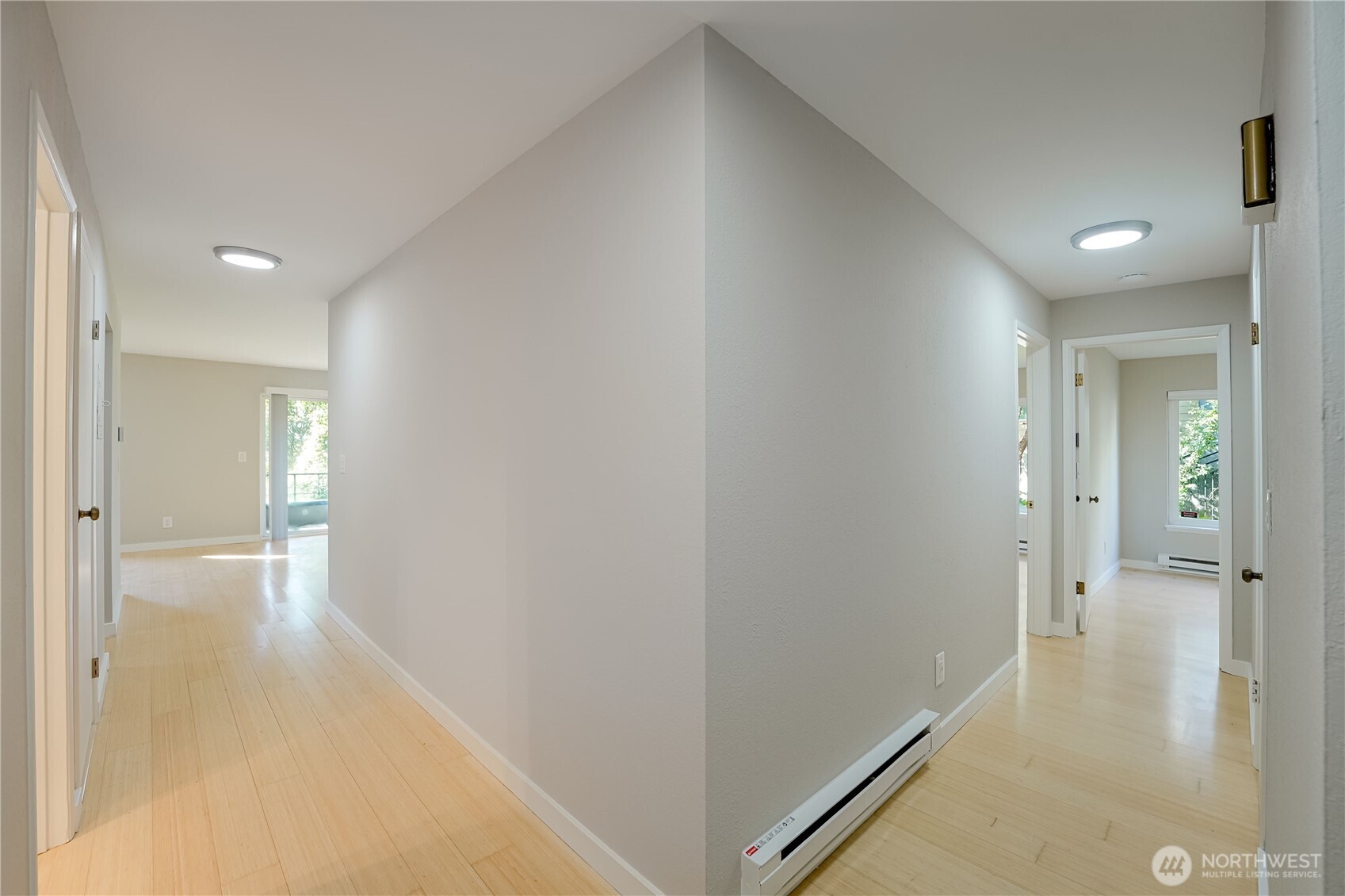 1100 South Atlantic Street, Unit 209 Seattle, WA 98134 - Photo 6 of 31 a view of a hallway with wooden floor