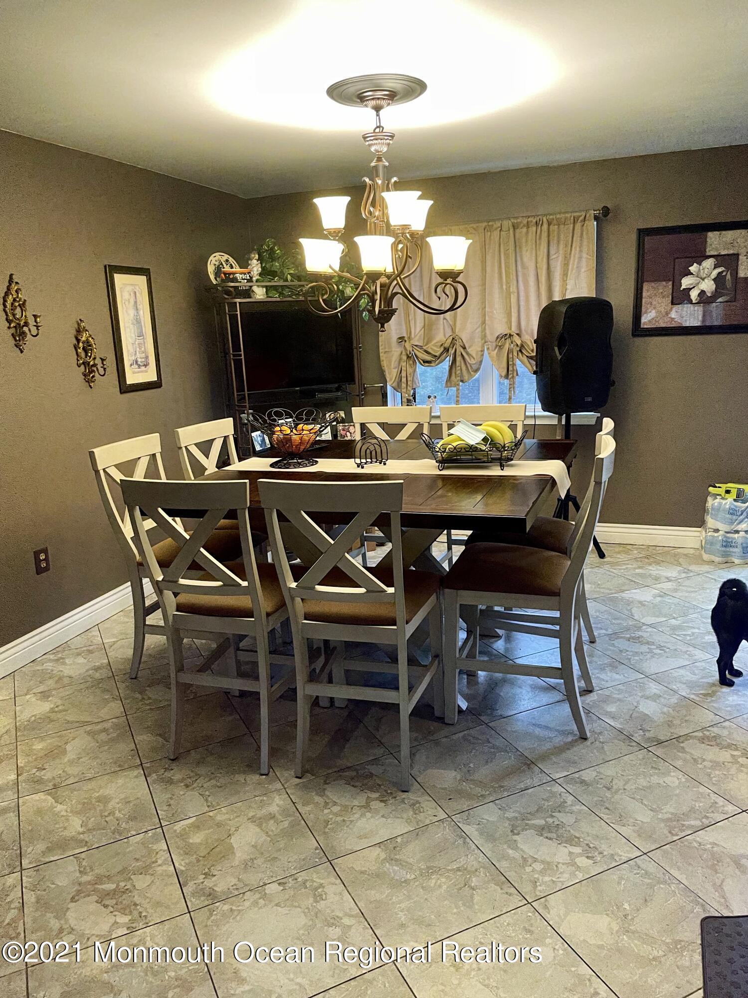 26 Netty Street Howell, NJ 07731 - Photo 3 of 11 a view of a dining room with furniture