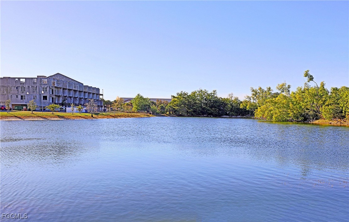 4199 Bellasol Circle, Unit 622 Fort Myers, FL 33916 - Photo 25 of 27 a view of a city street with a building