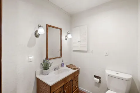 a bathroom with a sink and a toilet