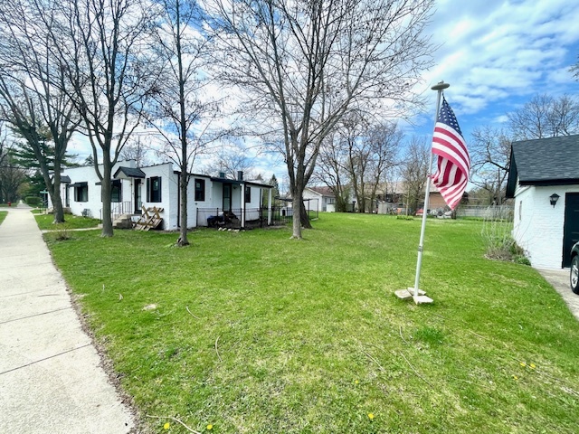302 West Naperville Road Westmont, IL 60559 - Photo 3 of 15 a view of a house with a yard