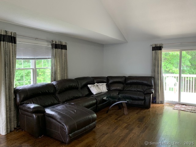 81 The Meadows, Unit 81 Enfield, CT 06082 - Photo 6 of 18 a living room with furniture and a large window