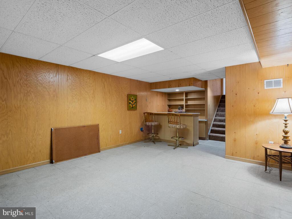 12714 Teaberry Road Silver Spring, MD 20906 - Photo 24 of 30 a room with furniture and natural light