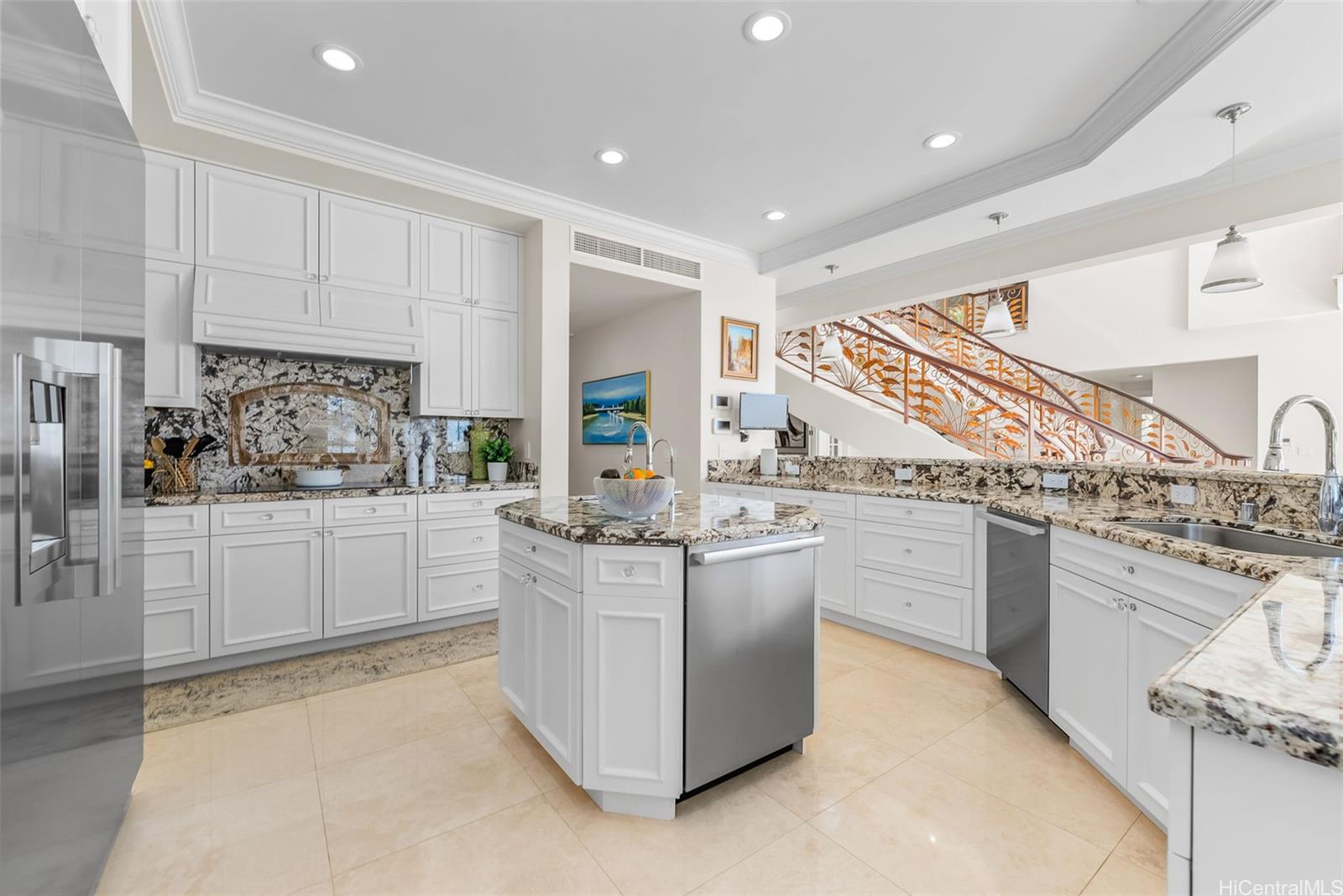 269 Kaialii Place Honolulu, HI 96821 - Photo 13 of 25 a kitchen with stainless steel appliances granite countertop a stove and cabinets