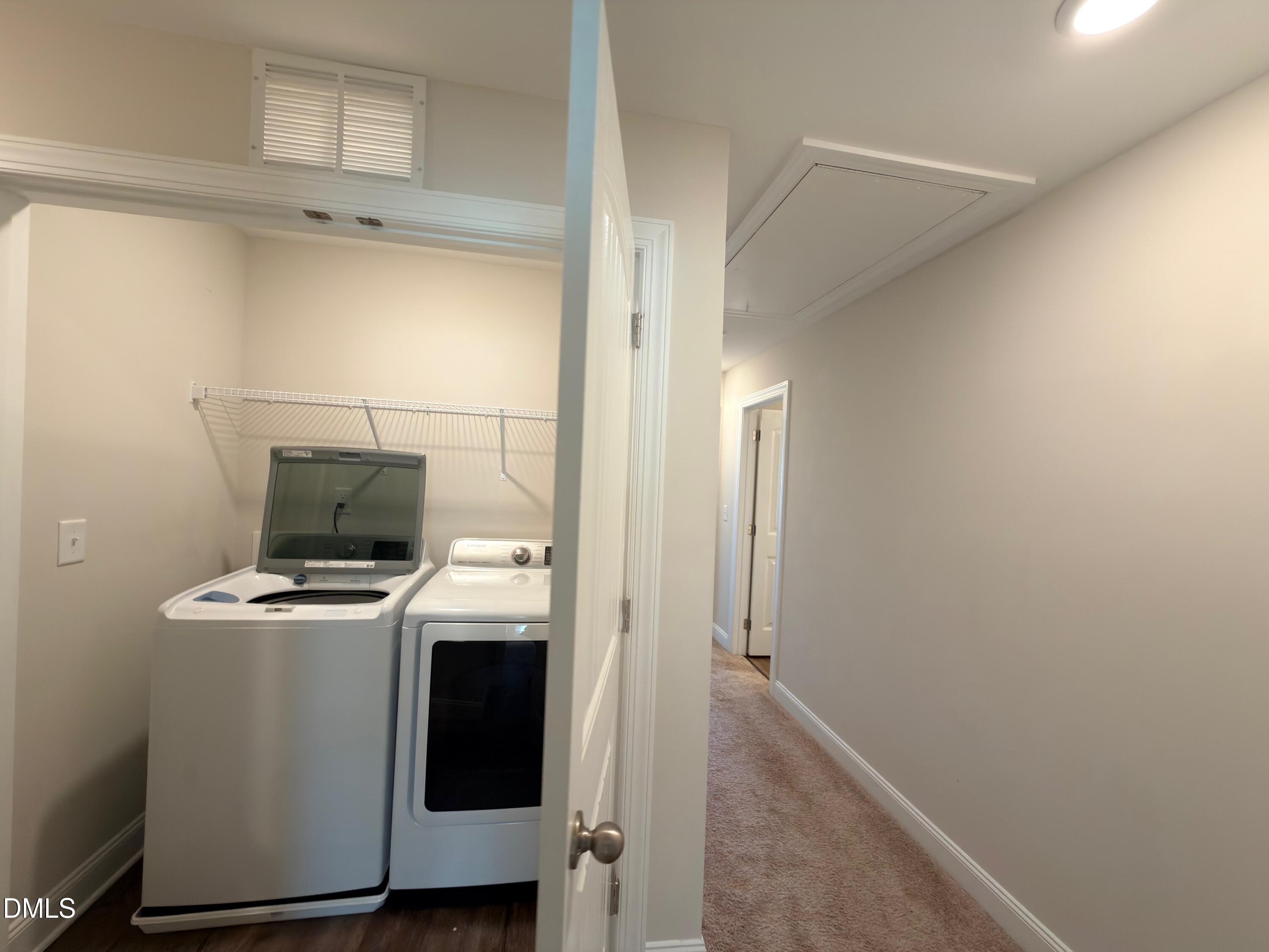 6928 Outfall Point Lane Raleigh, NC 27616 - Photo 12 of 33 a view of a storage & utility room in a house