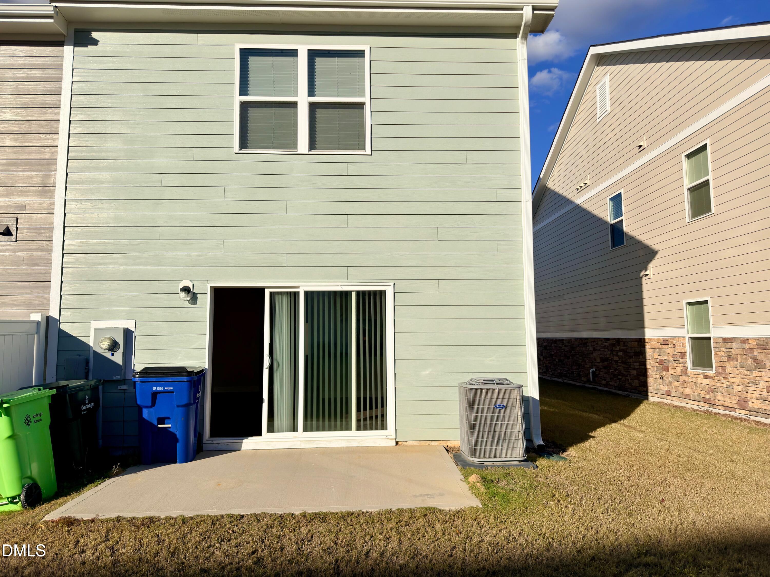 6928 Outfall Point Lane Raleigh, NC 27616 - Photo 26 of 33 a view of a house with a balcony