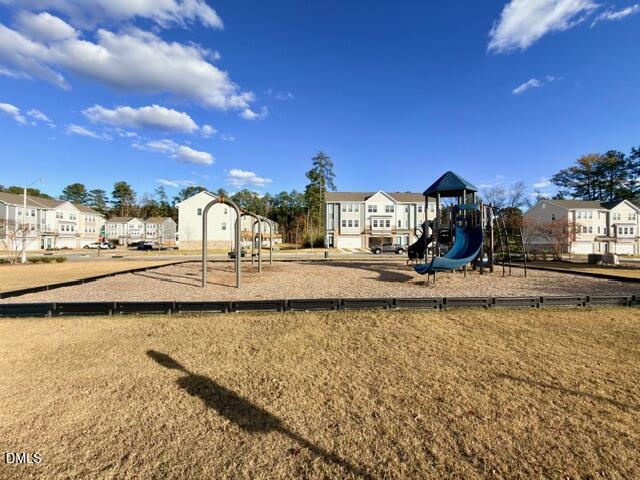 6928 Outfall Point Lane Raleigh, NC 27616 - Photo 29 of 33 a view of a swimming pool with an outdoor seating