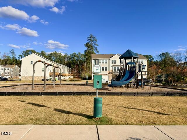 6928 Outfall Point Lane Raleigh, NC 27616 - Photo 33 of 33 a view of a swimming pool with a patio