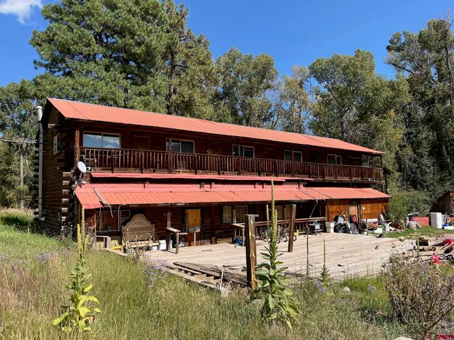 a view of a house with roof deck