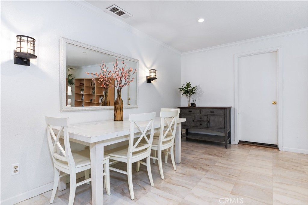 7695 Del Rio Road Atascadero, CA 93422 - Photo 35 of 75 a dining room with furniture and window