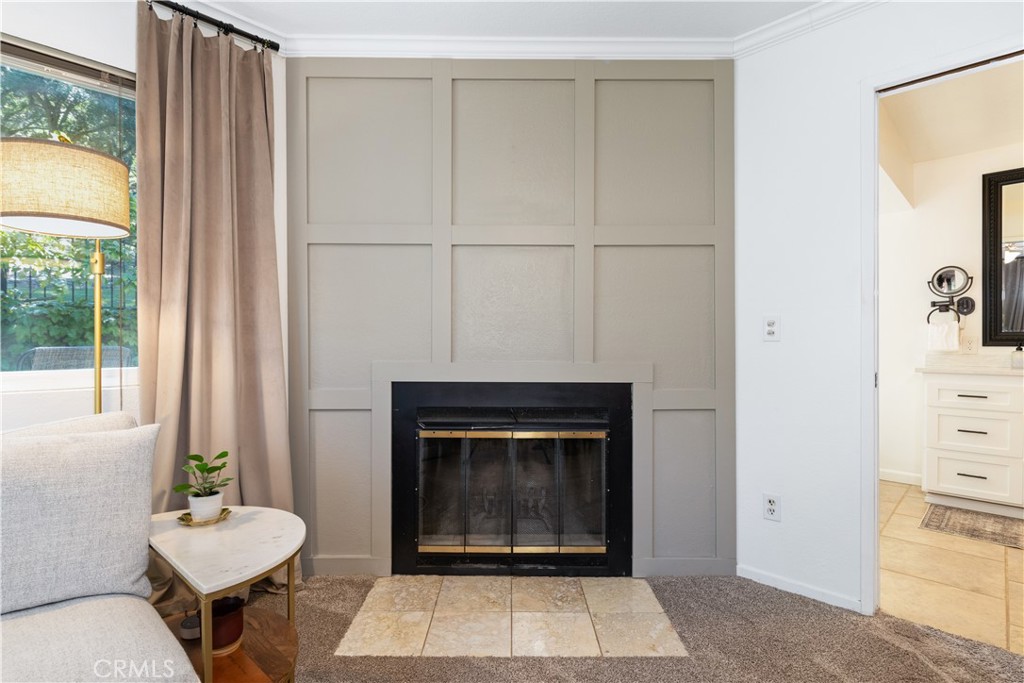 7695 Del Rio Road Atascadero, CA 93422 - Photo 45 of 75 a living room with furniture a window and a fireplace