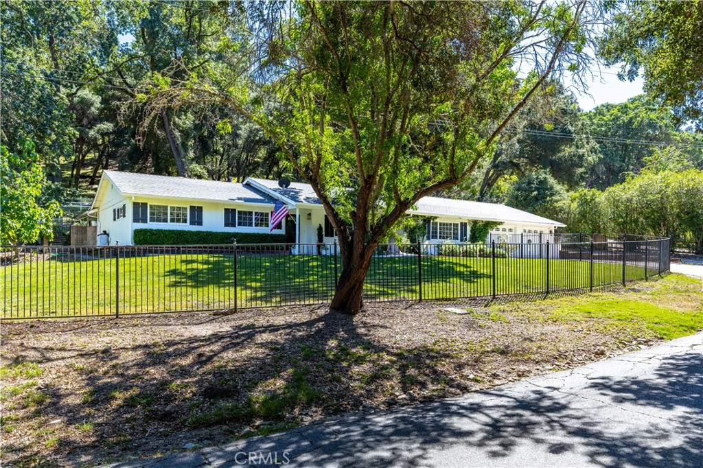 7695 Del Rio Road Atascadero, CA 93422 - Photo 6 of 75 a view of a house with a yard and sitting area