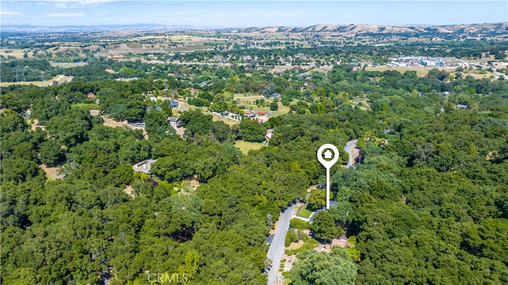 7695 Del Rio Road Atascadero, CA 93422 - Photo 74 of 75 a view of a city with lush green forest