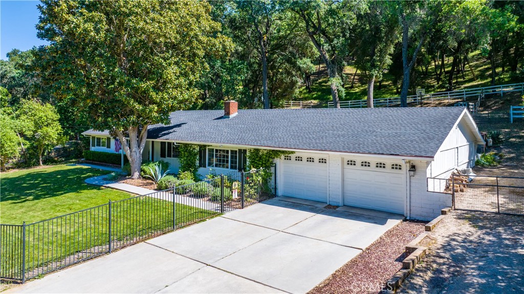 7695 Del Rio Road Atascadero, CA 93422 - Photo 9 of 75 a view of a house with a backyard