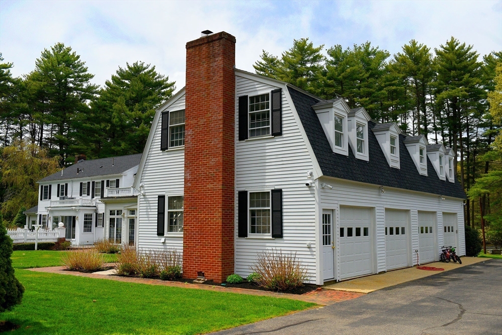 28 Pineswamp Road Ipswich, MA 01938 - Photo 9 of 42 a front view of a house with a yard