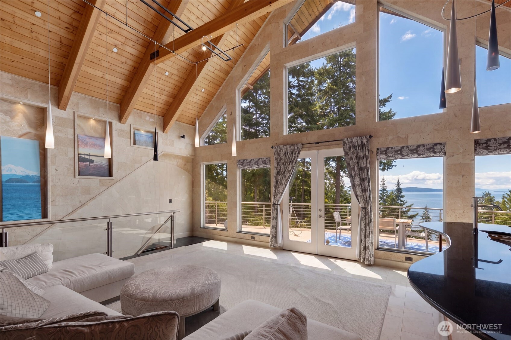 51 Willows Lane Friday Harbor, WA 98250 - Photo 6 of 40 a bedroom with furniture and large windows