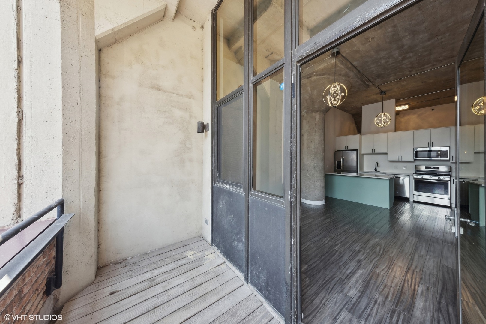 320 East 21st Street, Unit 215 Chicago, IL 60616 - Photo 19 of 25 a view of a kitchen from the hallway