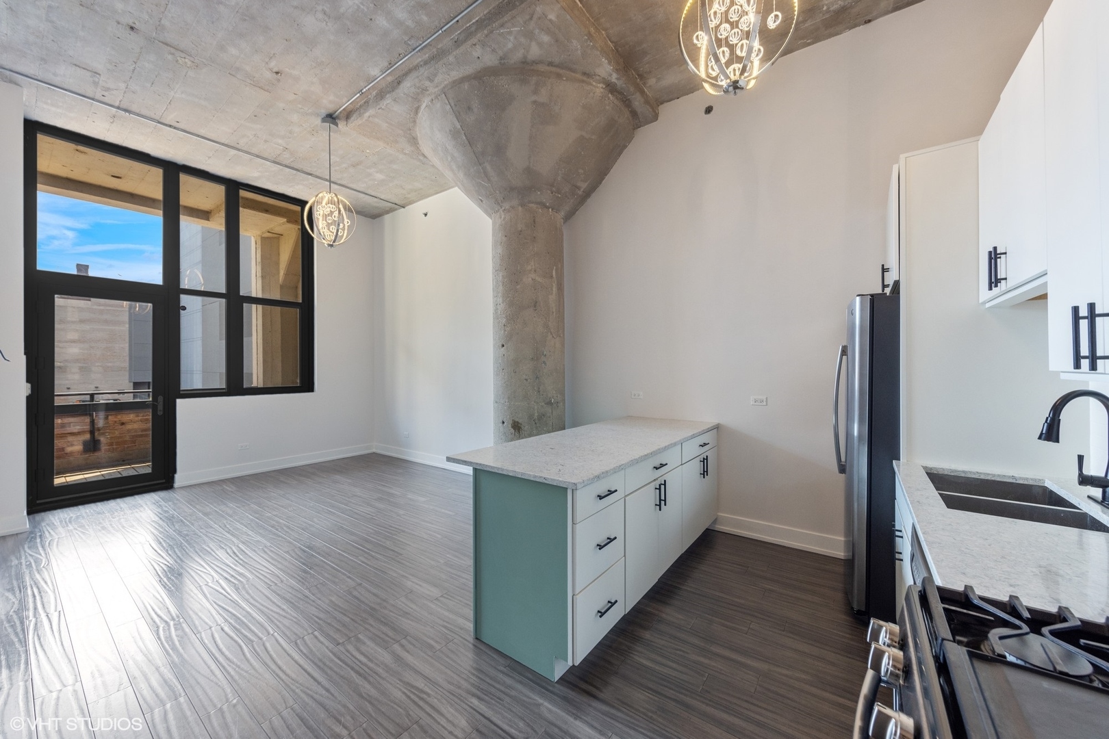 320 East 21st Street, Unit 215 Chicago, IL 60616 - Photo 7 of 25 a kitchen with stainless steel appliances granite countertop a stove and a refrigerator