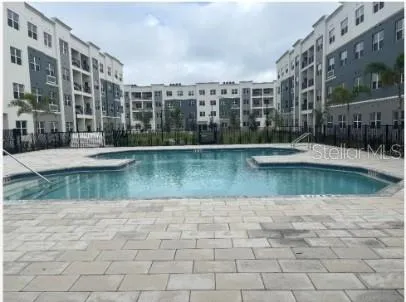 a view of lake with a large building
