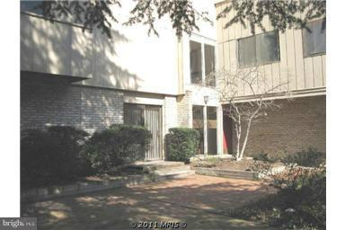 12140 Quorn Lane Reston, VA 20191 - Photo 2 of 6 a view of a house with a yard