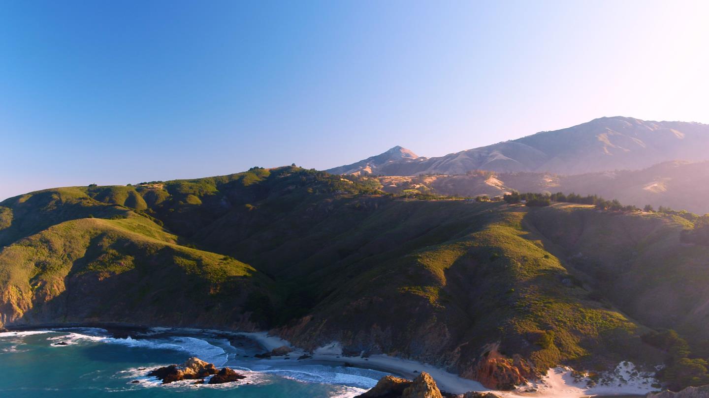 a view of a lake in middle of the town