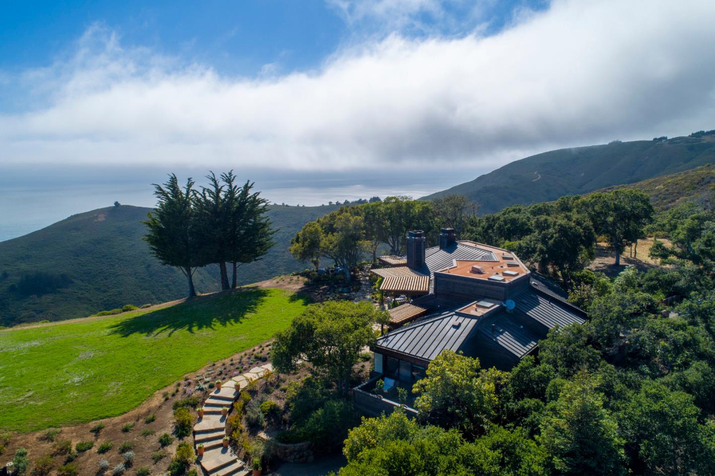 46820 Clear Ridge Road Big Sur, CA 93920 - Photo 2 of 26 an aerial view of a house with a garden