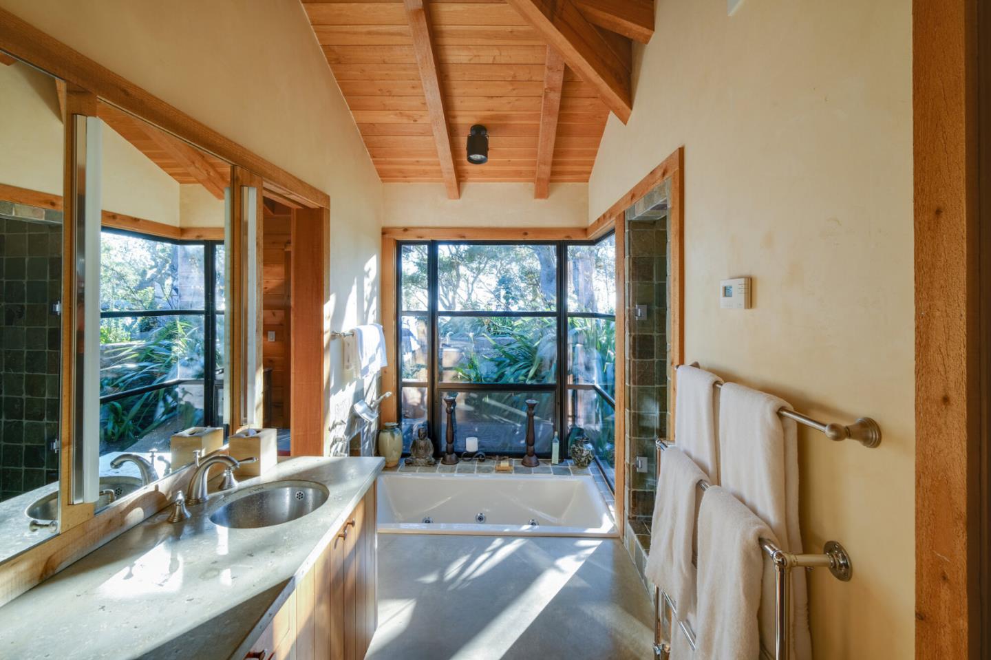 46820 Clear Ridge Road Big Sur, CA 93920 - Photo 15 of 26 a living room with furniture and a large window