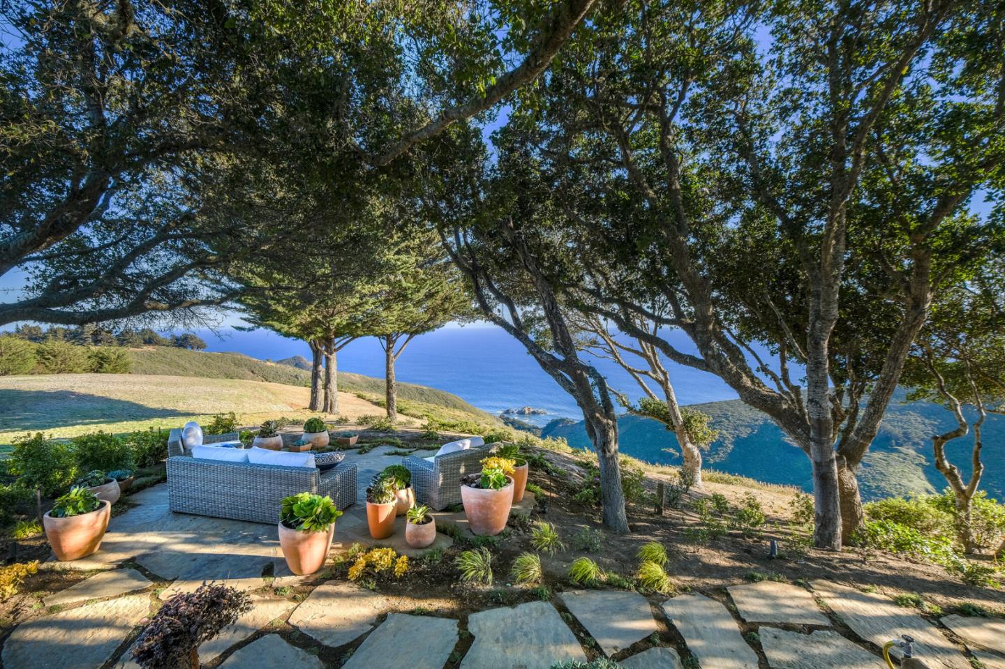 46820 Clear Ridge Road Big Sur, CA 93920 - Photo 16 of 26 a view of swimming pool with lawn chairs and plants