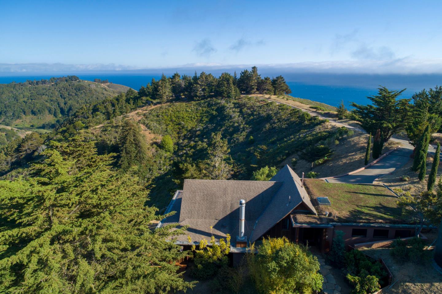 46820 Clear Ridge Road Big Sur, CA 93920 - Photo 23 of 26 an aerial view of a house with a yard and lake view