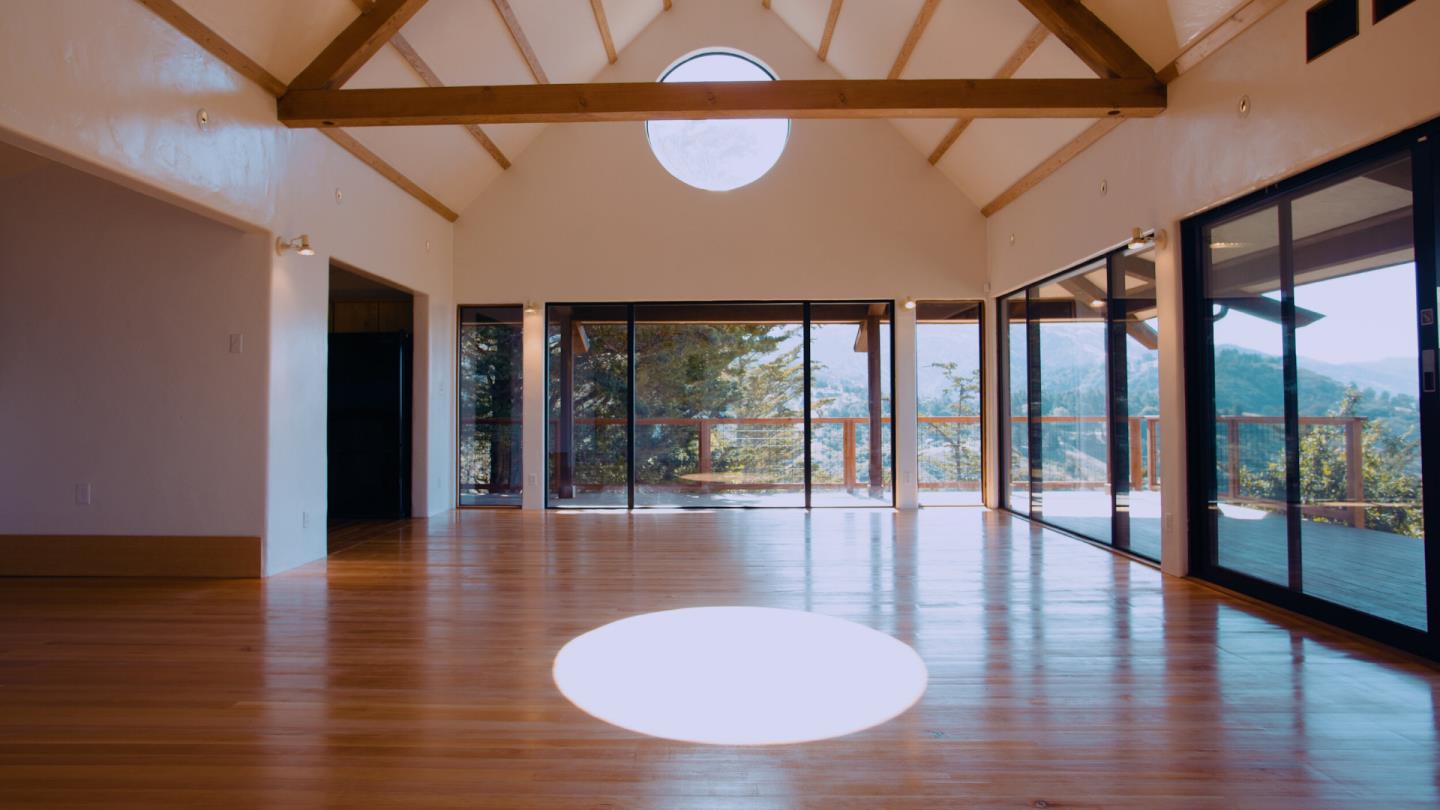 46820 Clear Ridge Road Big Sur, CA 93920 - Photo 24 of 26 a view of interior space with wooden floor and windows