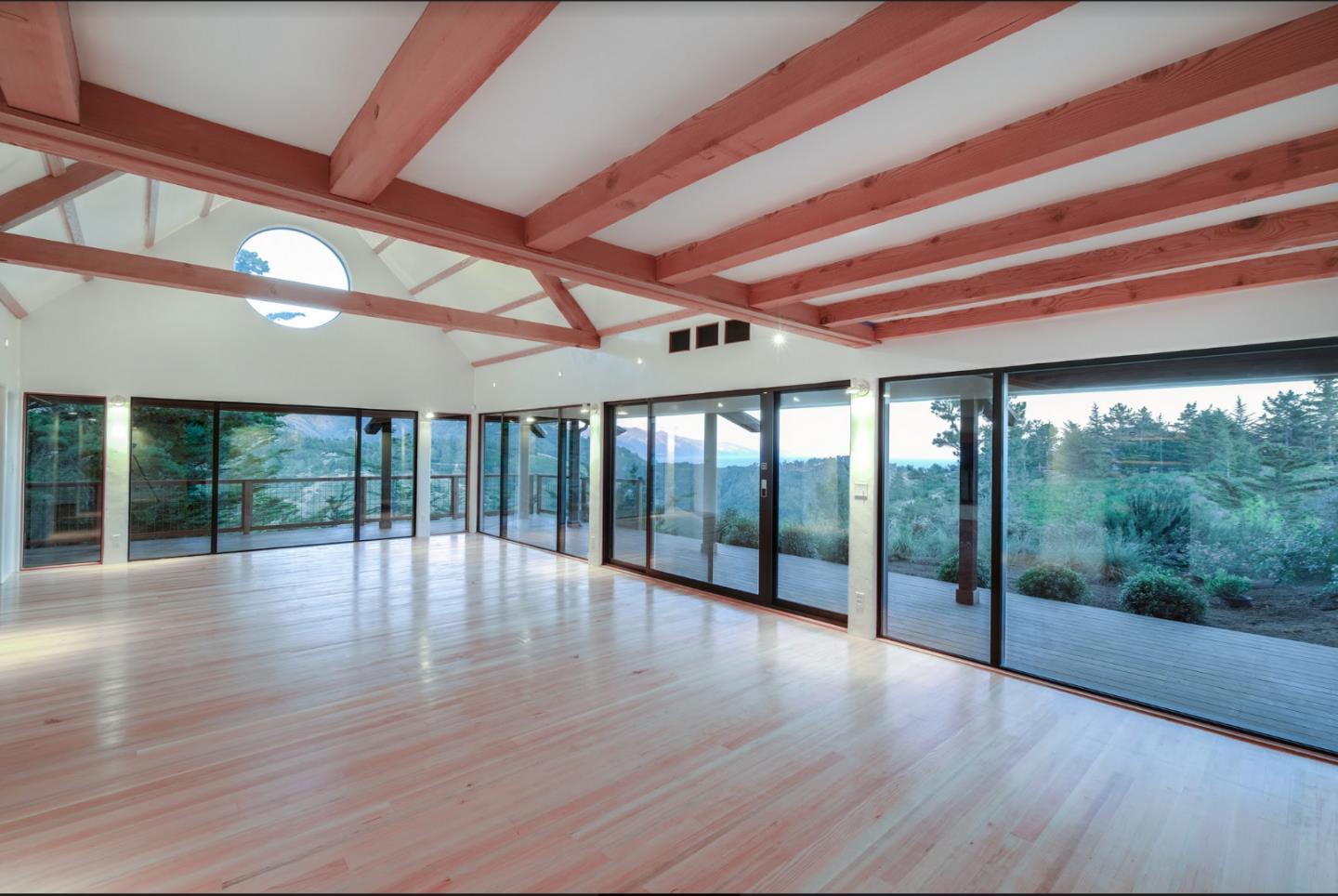 46820 Clear Ridge Road Big Sur, CA 93920 - Photo 25 of 26 a view of empty room with wooden floor and fan