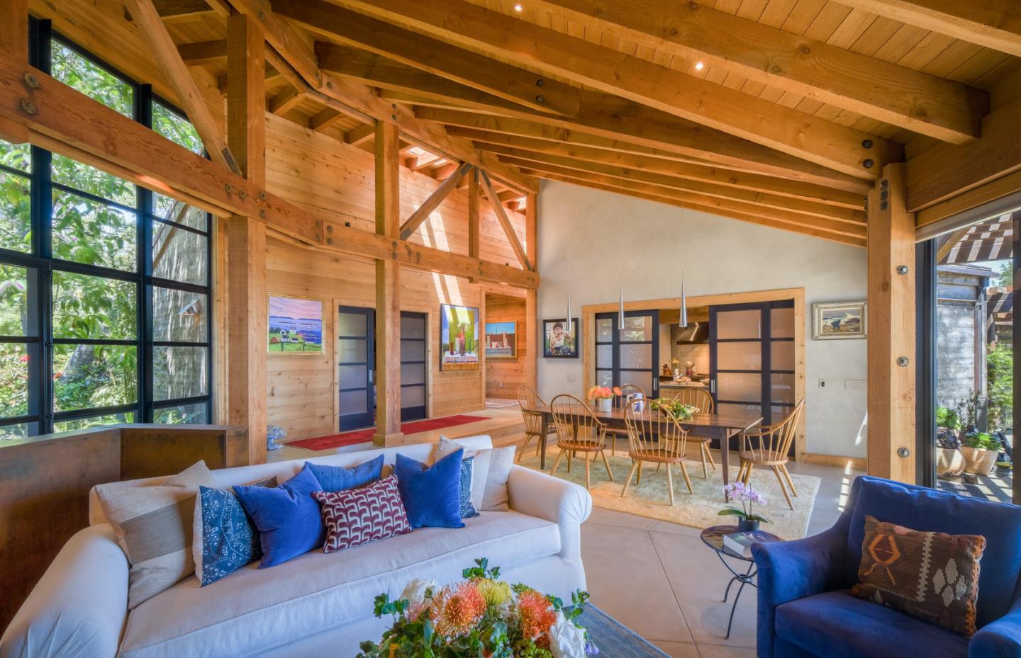46820 Clear Ridge Road Big Sur, CA 93920 - Photo 5 of 26 a living room with furniture and floor to ceiling windows
