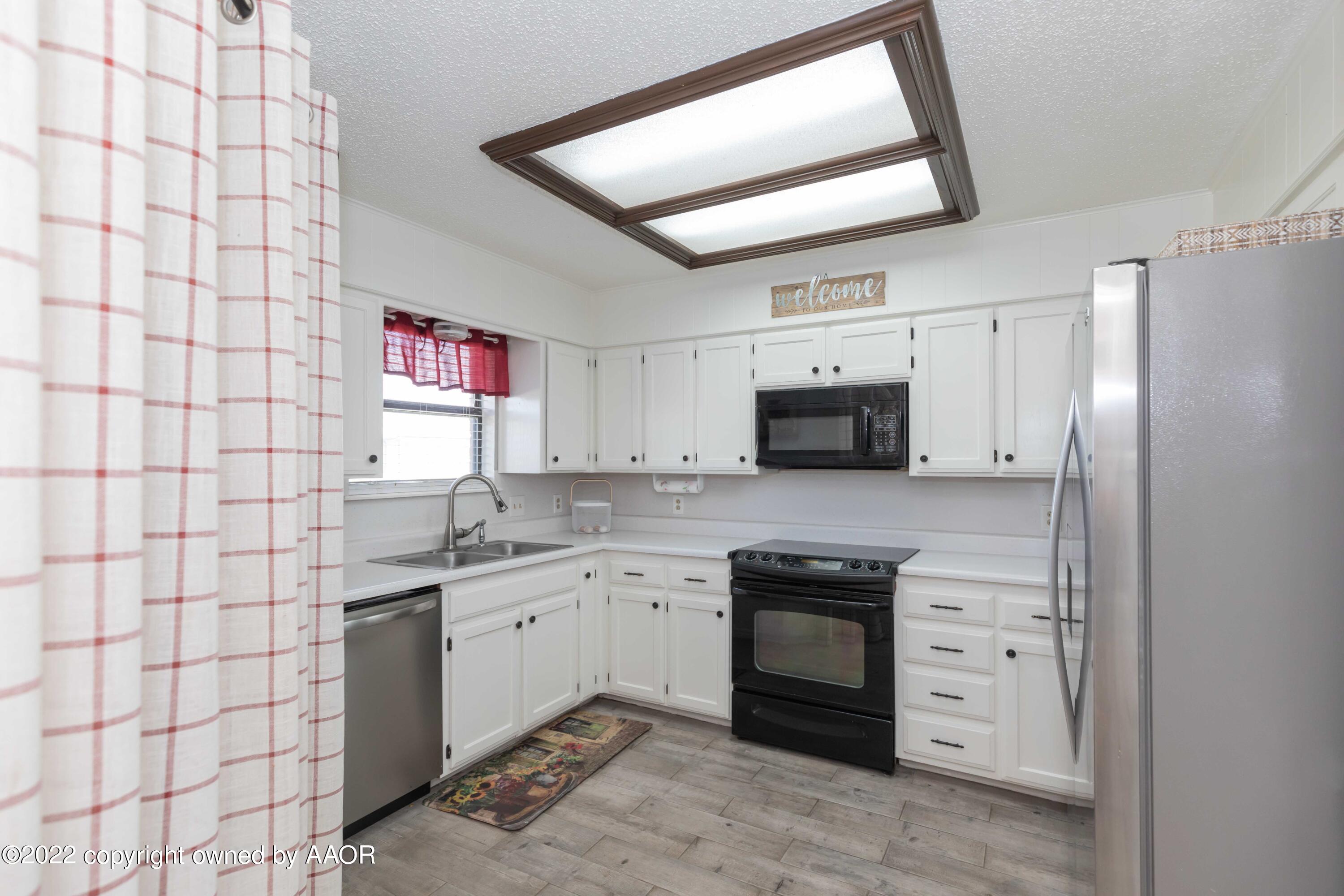 9700 Arlie Road Amarillo, TX 79108 - Photo 9 of 45 KITCHEN VIEW 1