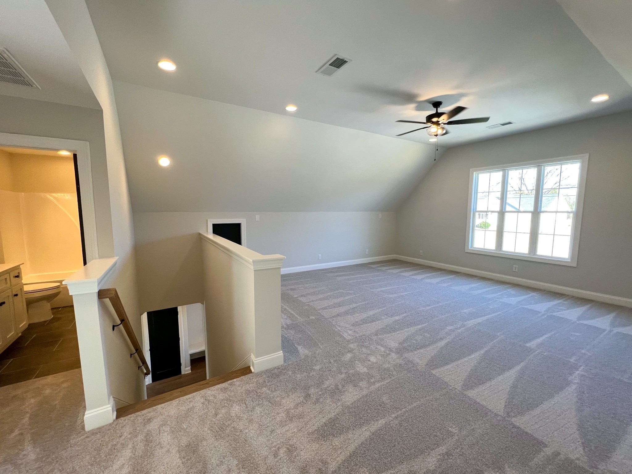 2445 North Commerce Road Lebanon, TN 37090 - Photo 11 of 14 wooden floor in an empty room with a window
