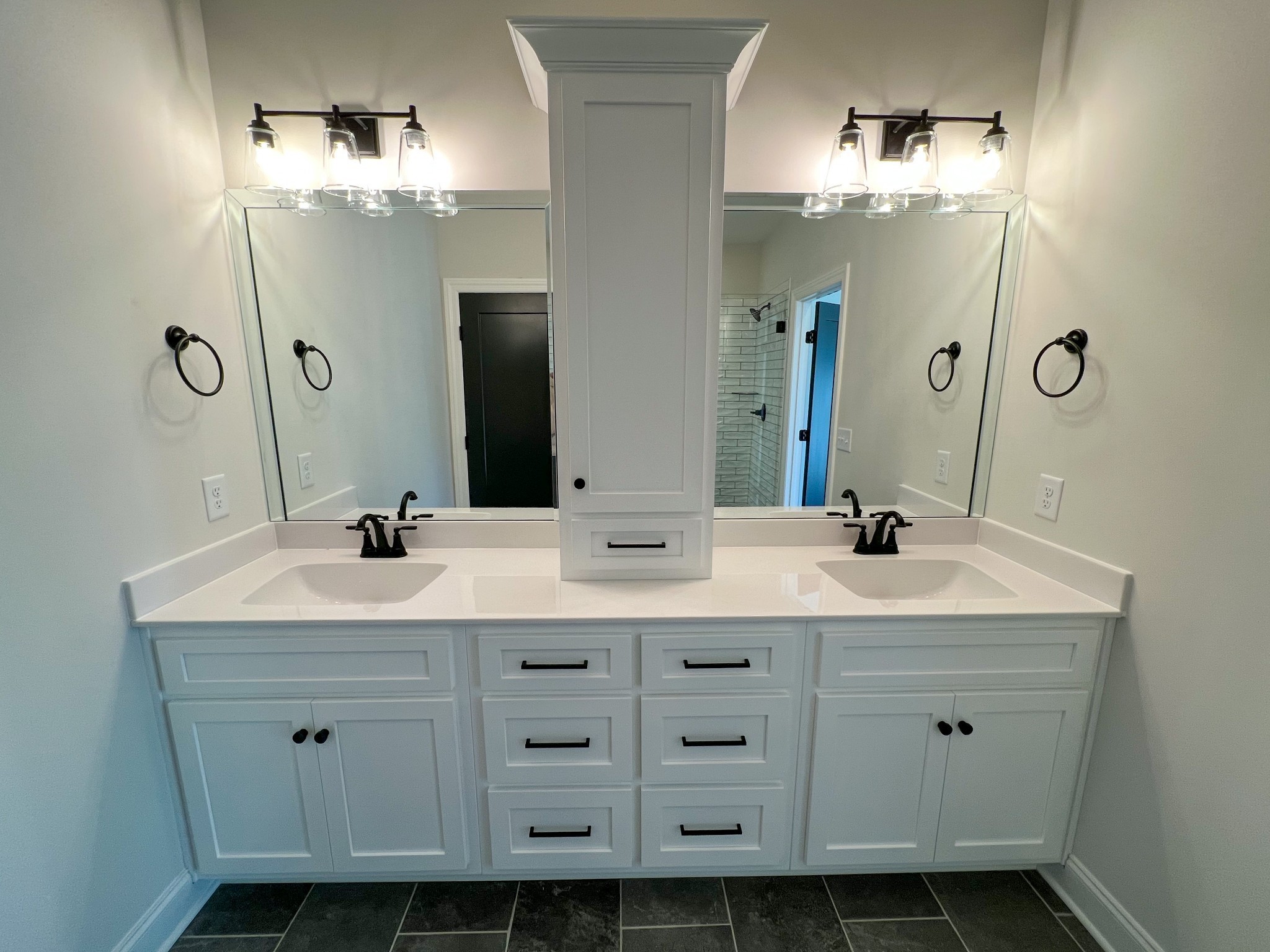 2445 North Commerce Road Lebanon, TN 37090 - Photo 8 of 14 a bathroom with a double vanity sink and a mirror
