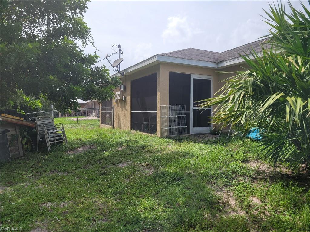 8352 Matanzas Road Fort Myers, FL 33967 - Photo 4 of 4 a house view with a garden space