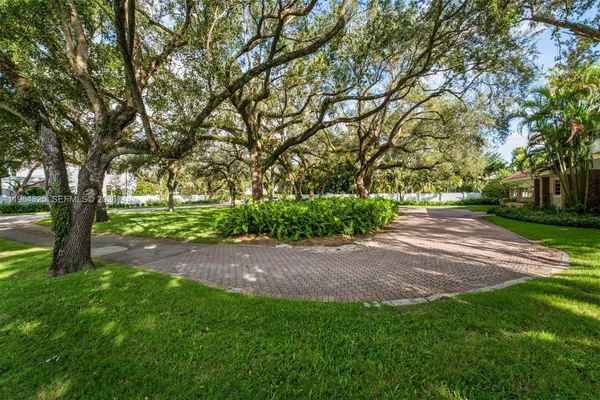 a view of backyard with green space