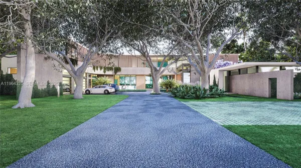 a view of a big yard with plants and large trees