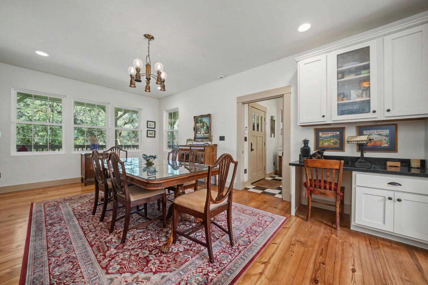14232 Sutter Creek Road Sutter Creek, CA 95685 - Photo 14 of 57 a view of a dining room with furniture window and wooden floor