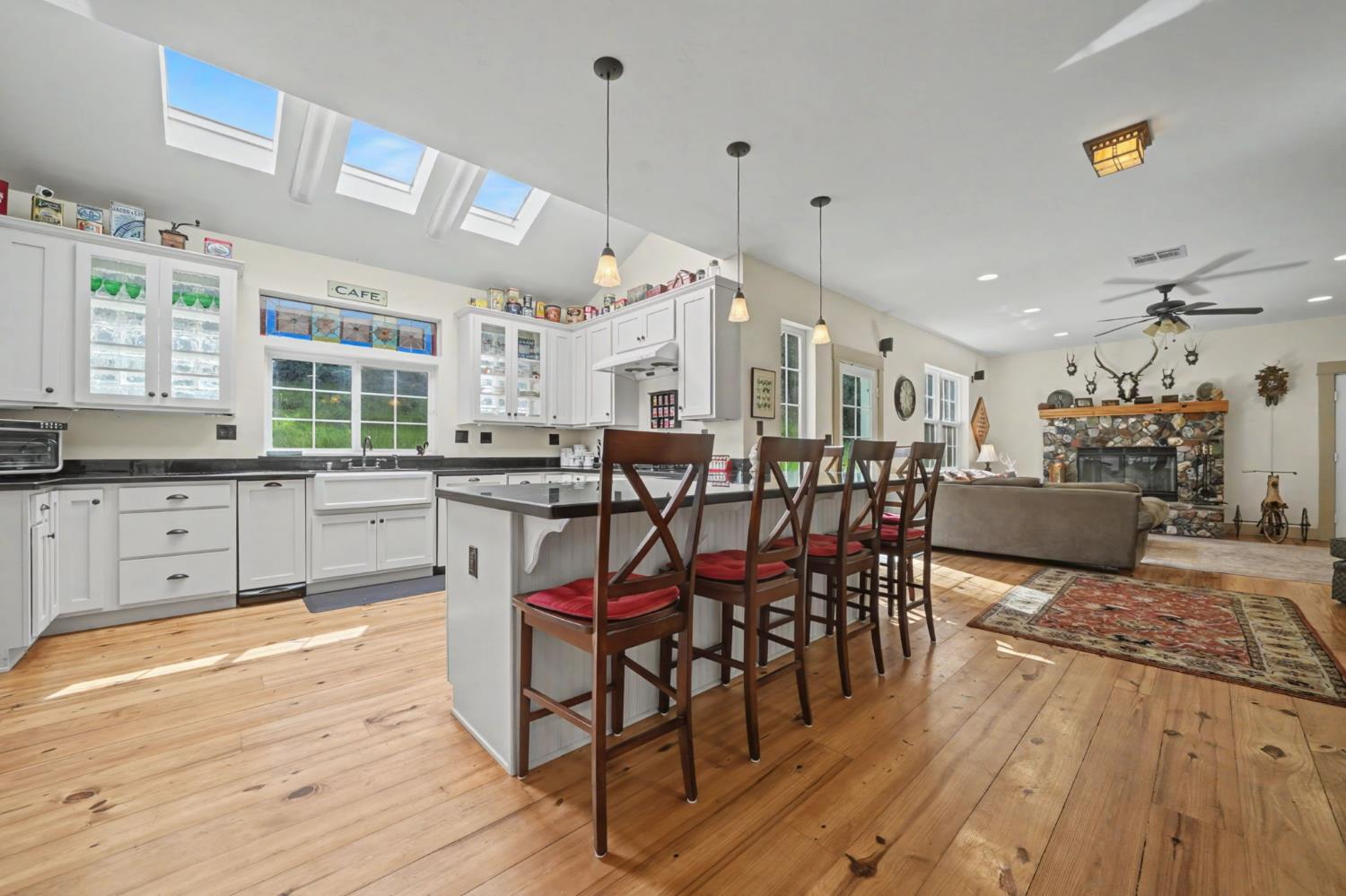 14232 Sutter Creek Road Sutter Creek, CA 95685 - Photo 20 of 57 a large kitchen with a table and chairs
