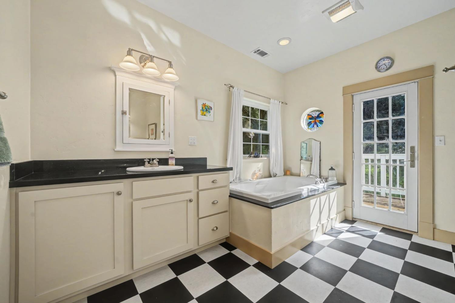 14232 Sutter Creek Road Sutter Creek, CA 95685 - Photo 39 of 57 PRIMARY BATH WITH TWO SINKS AND VANITIES