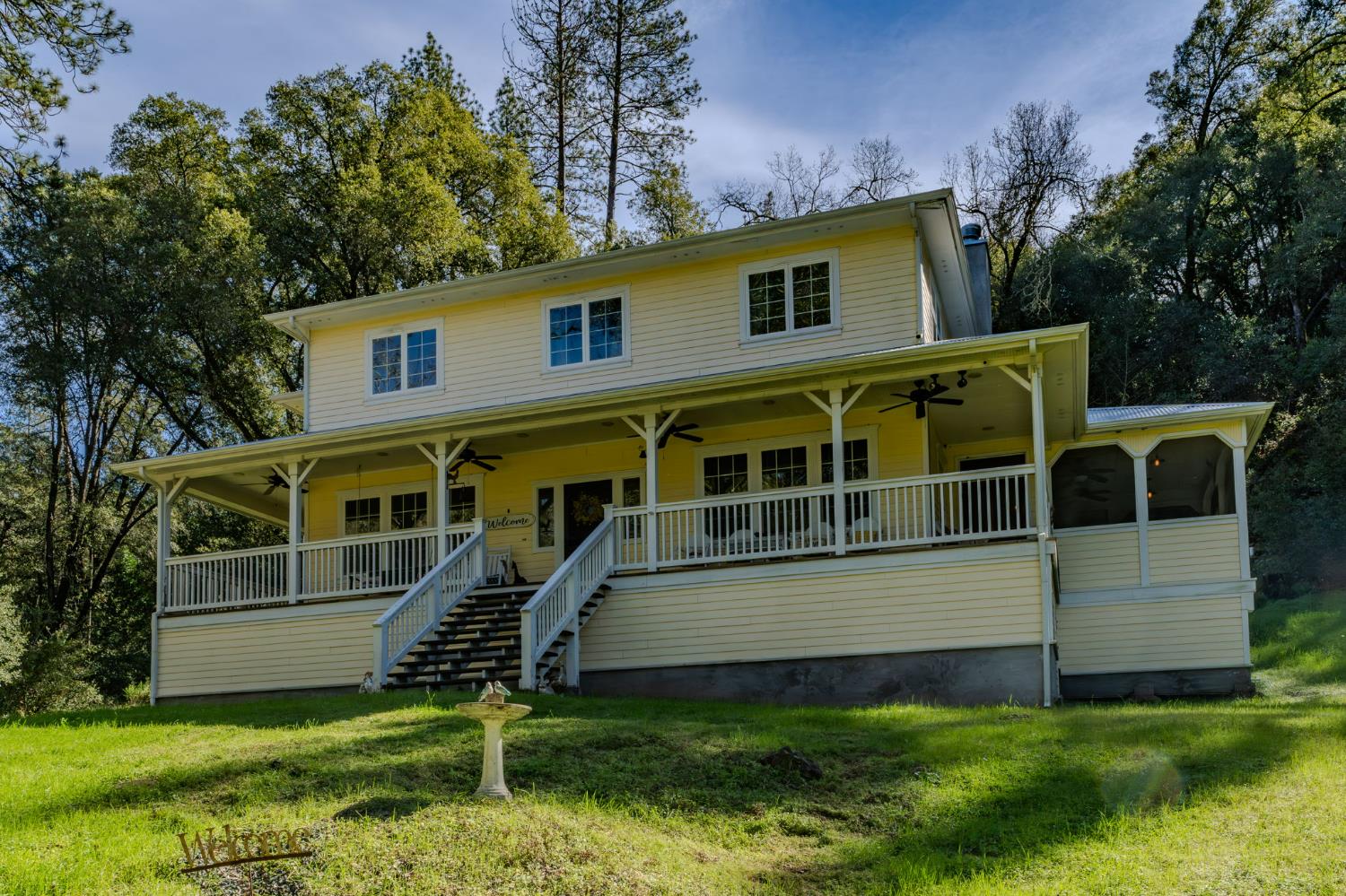14232 Sutter Creek Road Sutter Creek, CA 95685 - Photo 4 of 57 a view of a house with a yard