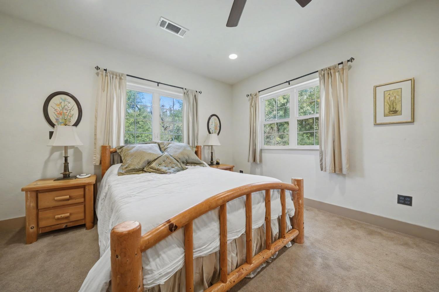 14232 Sutter Creek Road Sutter Creek, CA 95685 - Photo 43 of 57 a bedroom with a bed a window and dresser