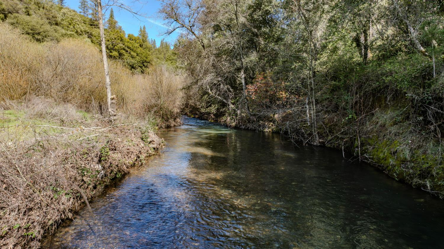 14232 Sutter Creek Road Sutter Creek, CA 95685 - Photo 51 of 57 a view of a lake in between two trees