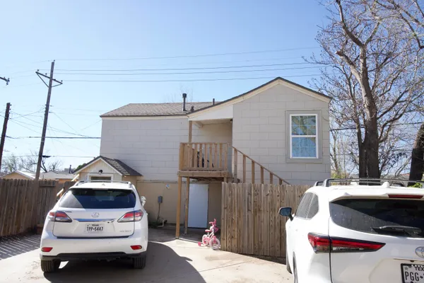 a car parked in front of a house