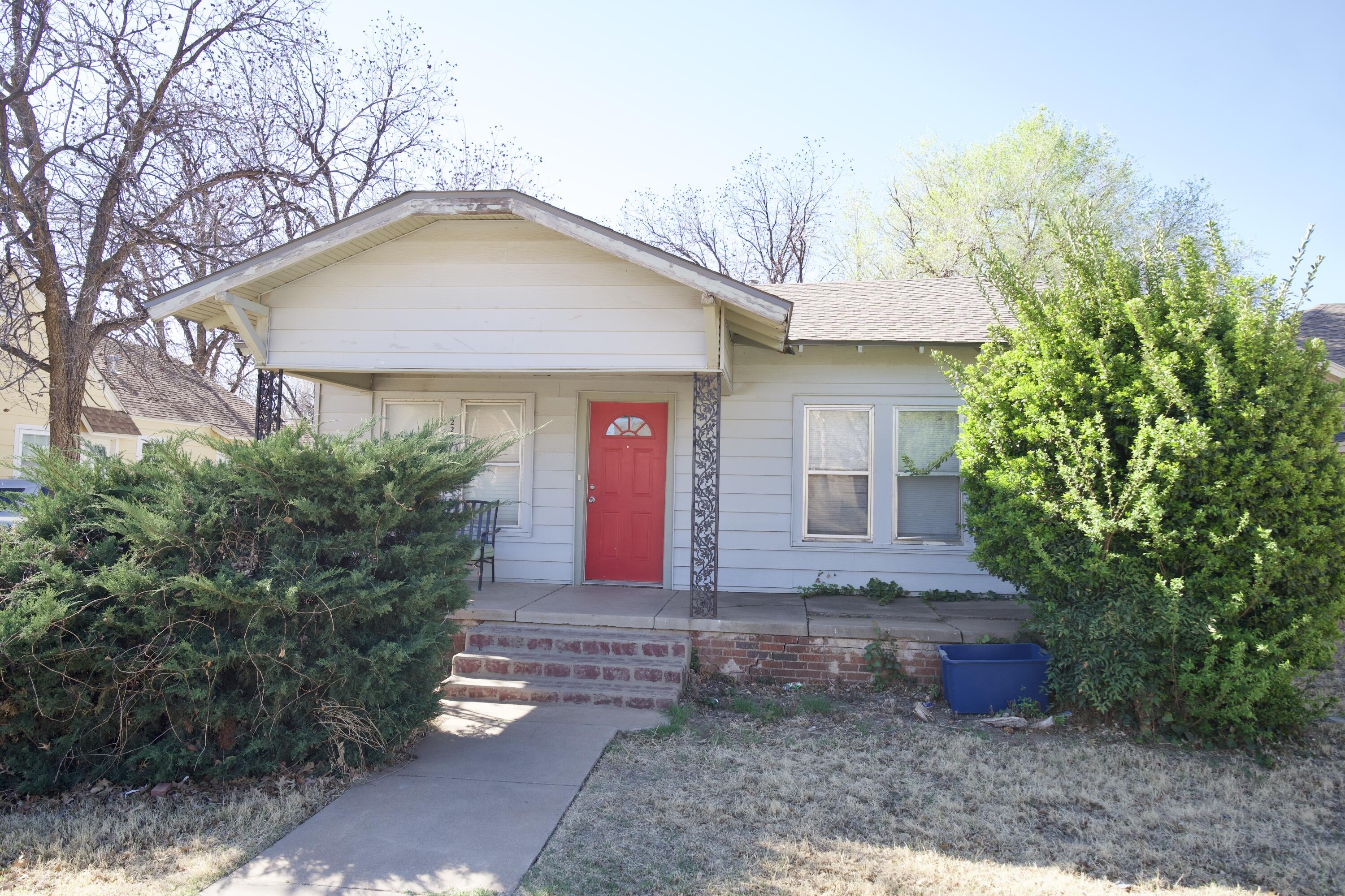 1919 17th Street Lubbock, TX 79401 - Photo 4 of 13 a front view of house with yard