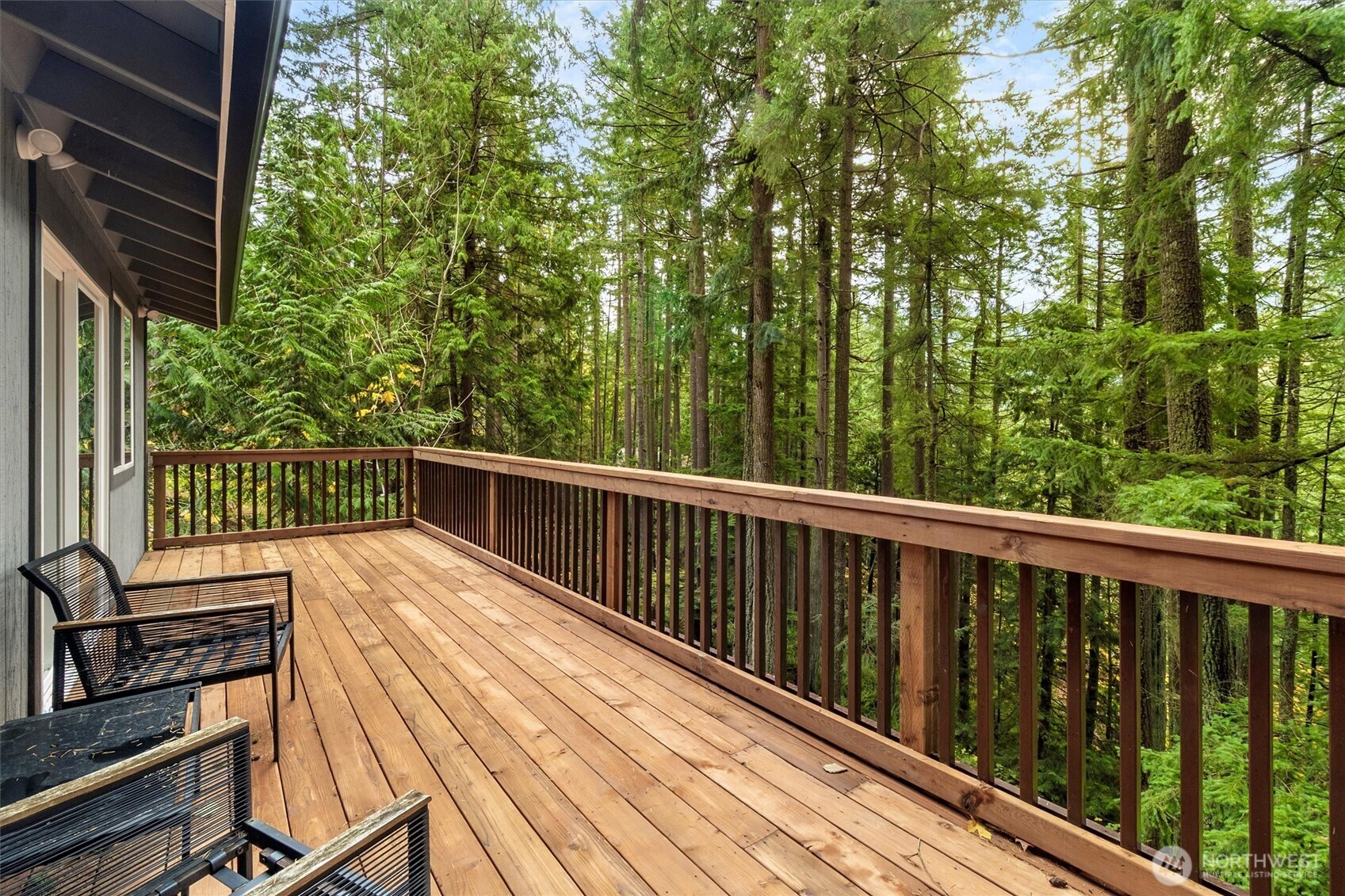 76 B Sudden Valley Drive Bellingham, WA 98229 - Photo 12 of 35 a view of balcony with wooden floor and fence
