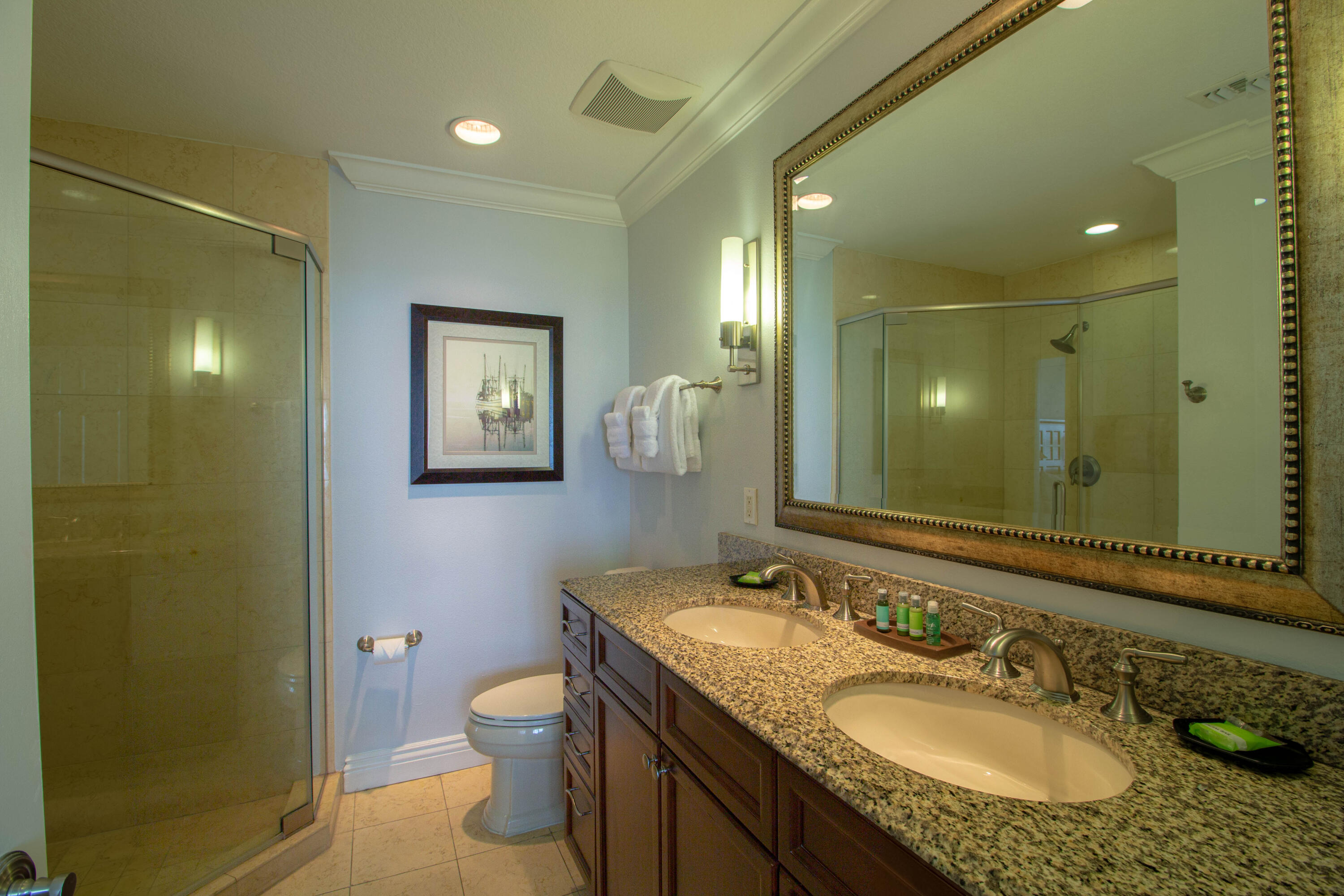 10 Harbor Boulevard, Unit E707H Destin, FL 32541 - Photo 13 of 28 a bathroom with a granite countertop sink toilet and shower